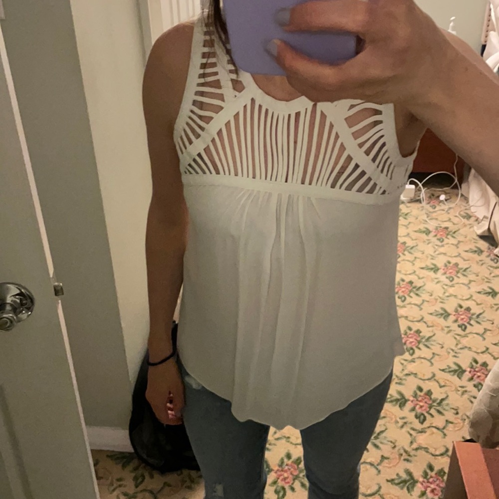 Pookie and Sebastian size XS tank.